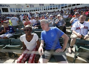 FILE - This March 2, 2019 file photo shows New York City Mayor Bill de Blasio and his wife Chirlane McCray between innings of a spring training baseball game between the Boston Red Sox and the Baltimore Orioles in Fort Myers, Fla. A would-be progressive standard bearer, Bill de Blasio has spent the past few months exploring a run, traveling to events in early primary states.