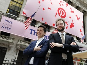 Pinterest co-founder & CEO Ben Silbermann, left, and fellow co-founder and chief product officer Evan Sharp, pose for photos outside the New York Stock Exchange, Thursday, April 18, 2019, before the company's IPO.