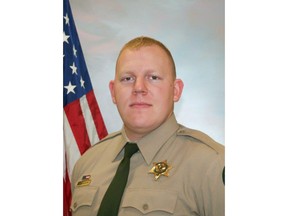 Cowlitz County Sheriff's Office Deputy Justin DeRosier, 29, was shot and killed Saturday, April 13, 2019, while checking on a disabled vehicle northeast of Kalama, Wa.. (Cowlitz County Sheriff's Office/The Columbian via AP)