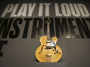 A guitar played by Chuck Berry is displayed at the entrance to the exhibit "Play It Loud: Instruments of Rock & Roll" at the Metropolitan Museum of Art in New York, Monday, April 1, 2019. The exhibit, which showcases the instruments of rock and roll legends, opens to the public on April 8 and runs until Oct. 1, 2019.