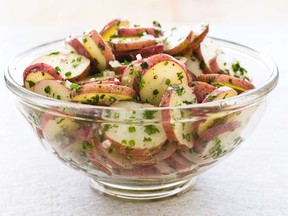 This undated photo provided by America's Test Kitchen in April 2019 shows a French Potato Salad with Dijon in Brookline, Mass. This recipe appears in the cookbook "Revolutionary Recipes."