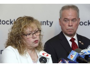 Rockland County Commissioner of Health Dr. Patricia Schnabel Ruppert, left, speaks as County Executive Ed Day watches during a news conference Tuesday, April 16, 2019 in New City, N.Y., on a new measles exclusion order that mandates anyone with measles to stay home, and those exposed to stay out of public spaces throughout Rockland county.