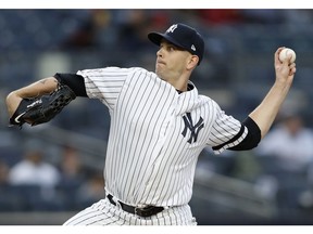 New York Yankees starting pitcher James Paxton delivers during the first inning of the team's baseball game against the Boston Red Sox, Tuesday, April 16, 2019, in New York.
