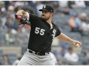 Chicago White Sox starting pitcher Carlos Rodon throws during the second inning of a baseball game against the New York Yankees, Sunday, April 14, 2019, in New York.