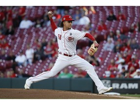 Cincinnati Reds starting pitcher Luis Castillo throws during the first inning of the team's baseball game against the Miami Marlins, Tuesday, April 9, 2019, in Cincinnati.