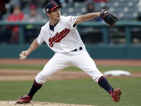 Cleveland Indians starting pitcher Trevor Bauer delivers in the first inning of a baseball game against the Toronto Blue Jays, Thursday, April 4, 2019, in Cleveland.