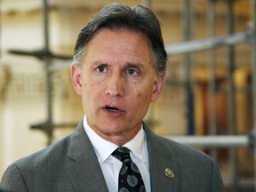 Oklahoma Attorney General Mike Hunter answers questions during a news conference Monday, April 1, 2019, in Oklahoma City. A $270 million settlement between the state of Oklahoma and the maker of OxyContin received high praise last week as an innovative way to help combat opioid addiction. Hunter is now facing bipartisan backlash from Oklahoma lawmakers who say he overstepped his authority and circumvented their role.