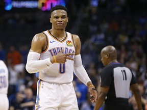 Oklahoma City Thunder guard Russell Westbrook (0) gestures to the crowd in the second half of an NBA basketball game against the Los Angeles Lakers, Tuesday, April 2, 2019, in Oklahoma City. Westbrook became just the second player in NBA history to have 20 points, 20 rebounds and 20 assists in a game as the Oklahoma City Thunder defeated the Los Angeles Lakers 119-103.