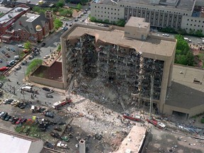 FILE - In this April 19, 1995, aerial file photo, the north side of the Alfred P. Murrah Federal Building in Oklahoma City is pictured after an explosion that killed 168 people and injured hundreds. As part of the city's annual day of remembrance Friday, April 19, 2019, – the 24th anniversary of the attack – civic leaders will plant a tree that was cloned from the Survivor Tree - a scarred American elm that survived the deadliest act of domestic terrorism on U.S. soil. (AP Photo/File)