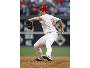 Philadelphia Phillies starting pitcher Aaron Nola throws during the first inning of the team's baseball game against the Washington Nationals, Tuesday, April 9, 2019, in Philadelphia.