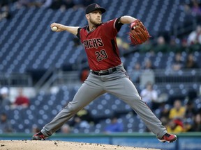 Arizona Diamondbacks starting pitcher Merrill Kelly delivers in the first inning of a baseball game against the Pittsburgh Pirates in Pittsburgh, Wednesday, April 24, 2019.