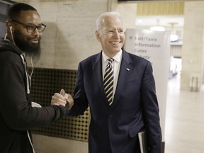 Democratic presidential candidate and former Vice President Joe Biden greets a few Amtrak employees as he arrives at 30th St. Station after attending a fundraiser in Philadelphia Thursday, April 25, 2019.