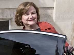 FILE - In this March 20, 2019 file photo, then French Minister of European Affairs Nathalie Loiseau gets into her car as she leaves the the weekly cabinet meeting at the Elysee Palace in Paris. Loiseau, who leads French president Emmanuel Macron's party in the May EU parliament elections, is facing criticism after online media Mediapart revealed she featured on a list alongside far-right candidates at a student's election 35 years ago.