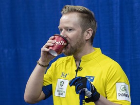 Sweden skip Niklas Edin has a sip of coffee during a break in play at the Men's World Curling Championship in Lethbridge, Alta. on Monday, April 1, 2019.