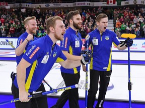 Team Sweden, left to right, skip Niklas Edin, second Rasmus Wranaa, third Oskar Eriksson and lead Christoffer Sundgren celebrate after defeating Canada in the gold medal game at the Men's World Curling Championship in Lethbridge, Alta. on Sunday, April 7, 2019.