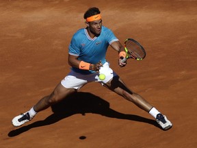 Rafael Nadal of Spain plays a shot against Jan-Lennard Struff of Germany during a quarterfinal match at the Barcelona Open Tennis Tournament in Barcelona, Spain, Friday, April 26, 2019.