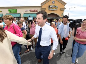 South Bend, Ind., Mayor Pete Buttigieg is led through supporters and members of the media as he leaves a meet-and-greet at a coffee house on April 8, 2019, in Las Vegas, Nev. Buttigieg recently launched an exploratory committee to run for the 2020 Democratic presidential nomination.