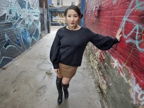 Renegade lawyer Nadia Guo stands in Toronto's Chinatown, Friday April 12, 2019.