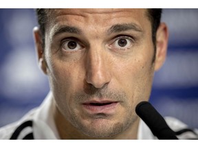 FILE - In this March 21, 2019 file photo, Argentina's national soccer team coach Lionel Scaloni attends a press conference in Madrid, Spain. Scaloni has been briefly hospitalized in Spain after a bicycle accident on Tuesday April 9, 2019 but Argentina's soccer federation says he did not sustain serious injuries during Tuesday's accident in Mallorca.