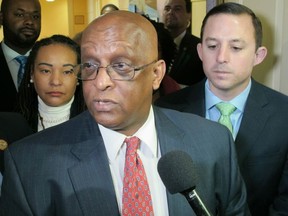 Acting Baltimore Mayor Jack Young talks to reporters after meeting with state senators who represent Baltimore on Tuesday, April 2, 2019 in Annapolis.  Young has become acting mayor after Catherine Pugh abruptly announced Monday that she's taking a leave of absence to "focus on her health" amid a political scandal about involving book sales.