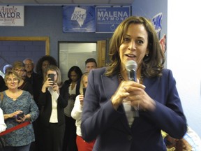 California Sen. Kamala Harris speaks to more than 100 people who jammed the Washoe County Democratic headquarters in Reno, Nev., Tuesday, April 2, 2019 for her fist presidential campaign stop in northern Nevada. Harris is bringing her Democratic presidential campaign to northern Nevada for the first time to visit party faithful and teachers and speak at a fundraiser for one of the biggest progressive groups in the early caucus state.