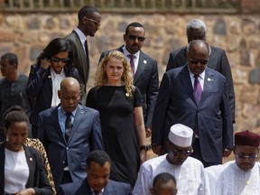 Governor General of Canada Julie Payette, center, arrives to lay a wreath at the Kigali Genocide Memorial in Kigali, Rwanda.