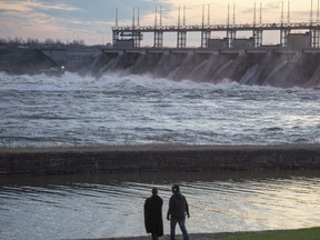 Water rushes through the Carillon Hydro electric dam Thursday, April 25, 2019 in Carillon, Quebec. Authorities have issued an evacuation alert further up river warning that the Belle Chutes dam is at risk of failing.THE CANADIAN PRESS/Ryan Remiorz