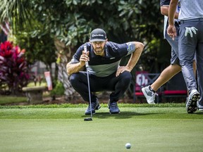 Dustin Johnson eyes his birdie putt on the 8th green during the second round of the RBC Heritage golf tournament in Hilton Head Island, S.C., Friday, April 19, 2019.