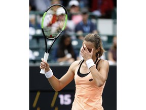 Petra Martic, from Croatia, reacts to a bad shot against Caroline Wozniacki, from Denmark, during their semifinal match at the Volvo Car Open tennis tournament in Charleston, S.C., Saturday, April 6, 2019.  Wozniacki won 6-3, 6-4.