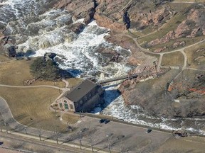 The James River overflows its banks on Saturday, March 30, 2019 in Sioux Falls, S.D. (South Dakota Civil Air Patrol  via AP)