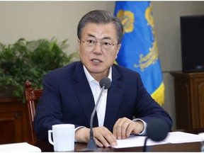 South Korean President Moon Jae-in speaks during a meeting with his aids at the presidential Blue House in Seoul, South Korea, Monday, April 15, 2019. Moon says he's ready for a fourth summit with North Korean leader Kim Jong Un to help salvage faltering nuclear negotiations between Washington and Pyongyang.