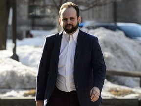 Joshua Boyle arrives at court in Ottawa on Wednesday, March 27, 2019. A lawyer for Boyle is suggesting his wife made up a story about him striking her in the face at their Ottawa apartment in the months after the couple were freed from captivity in Afghanistan.THE CANADIAN PRESS/Sean Kilpatrick