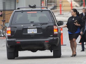 Former justice minister Jody Wilson-Raybould enters a vehicle as she leaves West Block on Parliament Hill in Ottawa, Tuesday, April 2, 2019.