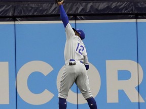 Kansas City Royals right fielder Jorge Soler makes a leaping catch of a fly-out by Tampa Bay Rays' Joey Wendle during the first inning of a baseball game Monday, April 22, 2019, in St. Petersburg, Fla.