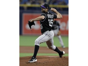 Colorado Rockies starting pitcher Chad Bettis delivers to the Tampa Bay Rays during the first inning of a baseball game Monday, April 1, 2019, in St. Petersburg, Fla.