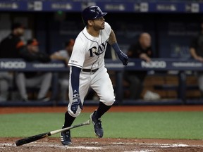 Tampa Bay Rays' Tommy Pham watches his home run off Baltimore Orioles starting pitcher Andrew Cashner during the third inning of a baseball game Thursday, April 18, 2019, in St. Petersburg, Fla.