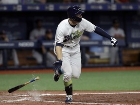 Tampa Bay Rays' Austin Meadows watches his two-run triple off Boston Red Sox pitcher Bobby Poyner during the seventh inning of a baseball game Saturday, April 20, 2019, in St. Petersburg, Fla.