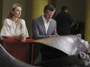 California Gov. Gavin Newsom with his wife, Jennifer Siebel Newsom visit the tomb of Archbishop Oscar Romero at Metropolitan Cathedral in San Salvador, El Salvador, Sunday, April 7, 2019. Newsom visited the tomb of Archbishop Romero, the Salvadoran priest assassinated in 1980 due to his advocacy for human rights and the poor.