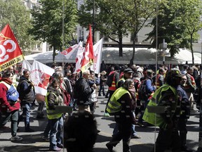 Yellow Vest demonstrators march in Paris, during another protest Saturday April 27, 2019. Yellow vest protesters remain a force in French politics despite ups and downs in the five months after their movement started.