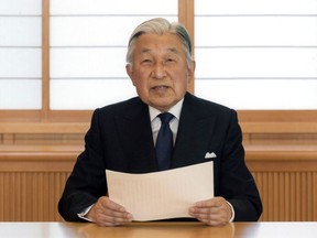 FILE - In this Aug. 7, 2016, file photo, provided by the Imperial Household Agency of Japan, Japan's Emperor Akihito reads a message for recording at the Imperial Palace in Tokyo. Akihito expressed concern about fulfilling his duties as he ages in an address to the public in a 10-minute recorded speech broadcast on national television that was remarkable for its rarity and its hinted possibility that he may want to abdicate in a few years. Akihito is ending his three-decade reign Tuesday, April 30, 2019 as he abdicates to his son, Crown Prince Naruhito, becoming the first to do so in 200 years, in a step nobody today has witnessed.