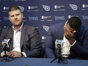 Mississippi State defensive tackle Jeffery Simmons, right, wipes tears as Tennessee Titans general manager Jon Robinson speaks about him during a news conference Friday, April 26, 2019, in Nashville, Tenn. Simmons was selected in the first round of the NFL football draft by the Titans.