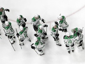 Dallas Stars players celebrate after defeating the Nashville Predators in Game 5 of an NHL hockey first-round playoff series Saturday, April 20, 2019, in Nashville, Tenn.