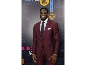 Florida State defensive end Brian Burns walks the red carpet ahead of the first round at the NFL football draft, Thursday, April 25, 2019, in Nashville, Tenn.