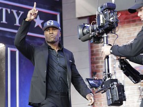 Vanderbilt cornerback Joejuan Williams enters the main stage after the New England Patriots selected Williams during the second round of the NFL football draft, Friday, April 26, 2019, in Nashville, Tenn.