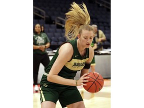 Baylor forward Lauren Cox dribbles the ball during a practice session for their women's Final Four NCAA college basketball semifinal game against Oregon Thursday, April 4, 2019, in Tampa, Fla.