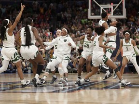 The Baylor team celebrates after defeating Notre Dame 82-81 during the Final Four championship game of the NCAA women's college basketball tournament Sunday, April 7, 2019, in Tampa, Fla.