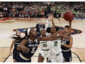 Baylor guard DiDi Richards (2) goes up for a shot past Notre Dame's Jackie Young (5) during the second half of the Final Four championship game of the NCAA women's college basketball tournament Sunday, April 7, 2019, in Tampa, Fla.
