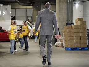 Magic Johnson  leaves the building prior to an NBA basketball game between the Lakers and the Portland Trail Blazers on Tuesday, April 9, 2019, in Los Angeles.