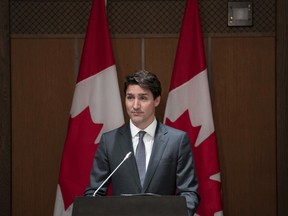 Prime Minister Justin Trudeau speaks at an evening caucus meeting on Parliament Hill in Ottawa on Tuesday, April 2, 2019. Trudeau has kicked both former attorney general Jody Wilson-Raybould and fellow ex-cabinet minister Jane Philpott out of the Liberal caucus.