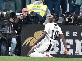 Juventus' Moise Kean celebrates after scoring his team's second goal during the Italian Serie A soccer match between Juventus and AC Milan at the Allianz Stadium in Turin, Italy, Saturday, April 6, 2019.